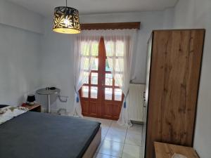 A bed or beds in a room at Sabine