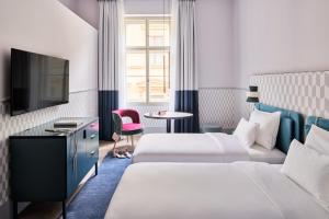 TV o dispositivi per l'intrattenimento presso Falkensteiner Boutique Hotel Prague