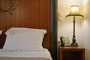 Posteľ alebo postele v izbe v ubytovaní Hotel Sophia