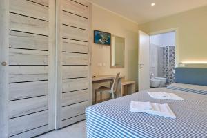 A bed or beds in a room at Hotel Villa Rodriguez