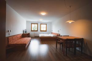 Posteľ alebo postele v izbe v ubytovaní Apartmány Jurica Boží Dar 84