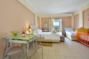 A bed or beds in a room at Xristina