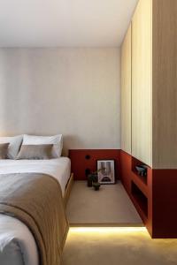 A bed or beds in a room at The Newel Psychiko