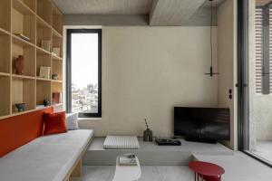 A television and/or entertainment centre at The Newel Psychiko