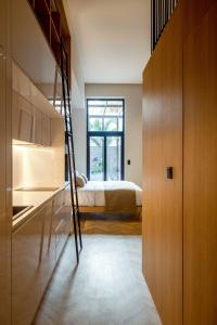 A bed or beds in a room at The Newel Psychiko