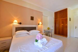 A bed or beds in a room at Xristina