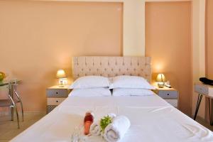 A bed or beds in a room at Xristina