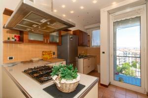Kjøkken eller kjøkkenkrok på M1 Bernini Cozy & Bright Apartment