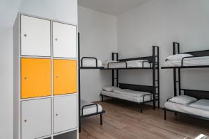 Postel nebo postele na pokoji v ubytování Equity Point Budapest
