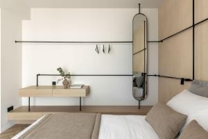 A bed or beds in a room at The Newel Psychiko