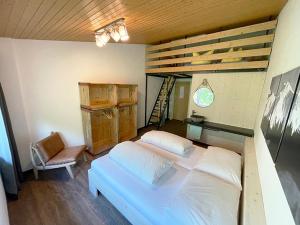Кровать или кровати в номере Hotel GO-IN