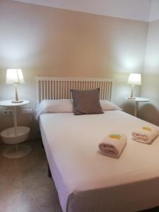 A bed or beds in a room at Mesones 54
