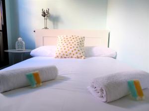 A bed or beds in a room at Mesones 54