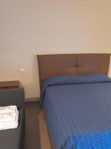 A bed or beds in a room at Le Zagare b&b