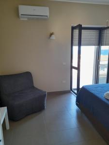 A bed or beds in a room at Le Zagare b&b