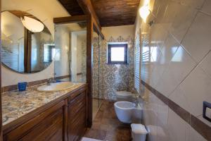 Kylpyhuone majoituspaikassa Residence Pietrabianca