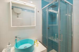 Koupelna v ubytování Appartamenti LE TRE API + 13 fotografií