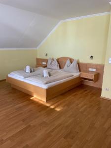 Postel nebo postele na pokoji v ubytování Landhaus Metzgerstubn