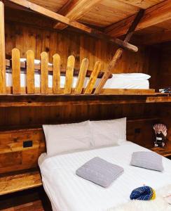 Postel nebo postele na pokoji v ubytování FORESCH HUS CHAMBRES D'HOTES