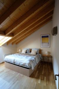 Krevet ili kreveti u jedinici u objektu El Descanso del Sol - Apartamento en Pirineos