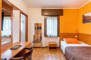 Postel nebo postele na pokoji v ubytování Laguna B&B