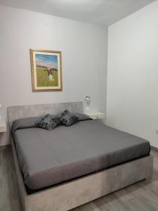 Katil atau katil-katil dalam bilik di Appartamento centrale