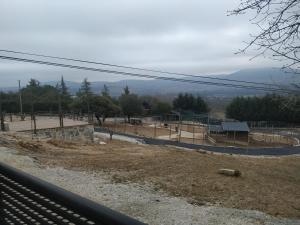 a view of a construction site with a park at Posada Rural SPA Granja LA TEJERA de Lozoya in Gargantilla del Lozoya