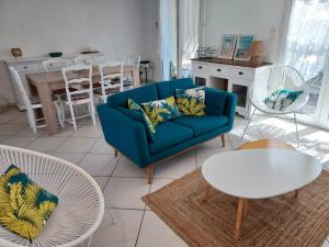 Khu vực ghế ngồi tại Charmante maison Leucate avec garage, à proximité de la plage