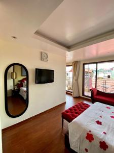 Postel nebo postele na pokoji v ubytování Art Hotel Ha Noi
