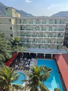 an aerial view of a hotel with a swimming pool at Acrópolis Marina Hotel in Angra dos Reis