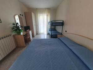 Letto o letti in una camera di Relais Villa agave