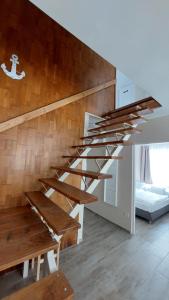 Posteľ alebo postele v izbe v ubytovaní TópART Apartman C + 27 fotografií
