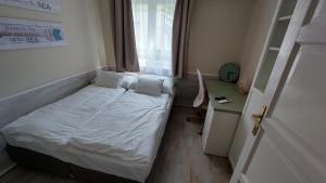 Posteľ alebo postele v izbe v ubytovaní TópART Apartman C