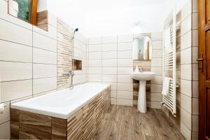 Koupelna v ubytování Pallos Apartments
