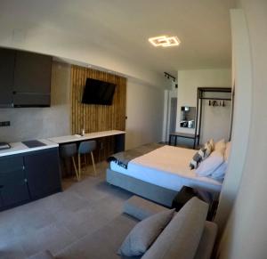 Televízia a/alebo spoločenská miestnosť v ubytovaní Aellw cozy apartment 1