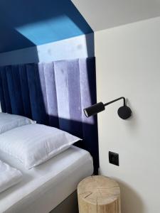 Posteľ alebo postele v izbe v ubytovaní Dubois Apartments Kołobrzeg