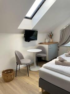 Posteľ alebo postele v izbe v ubytovaní Dubois Apartments Kołobrzeg