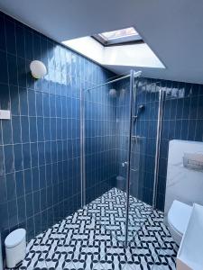 Kúpeľňa v ubytovaní Dubois Apartments Kołobrzeg