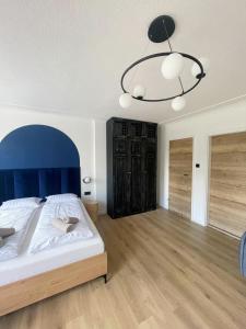 Posteľ alebo postele v izbe v ubytovaní Dubois Apartments Kołobrzeg