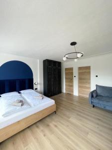Posteľ alebo postele v izbe v ubytovaní Dubois Apartments Kołobrzeg