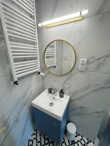 Kúpeľňa v ubytovaní Dubois Apartments Kołobrzeg