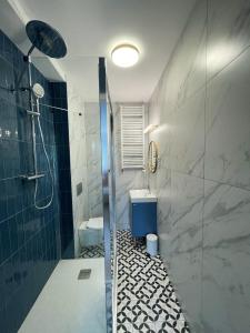 Kúpeľňa v ubytovaní Dubois Apartments Kołobrzeg