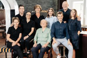 a group of people posing for a picture at Hotel Park Cafe Reichl in Bad Abbach