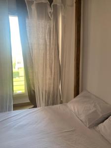 A bed or beds in a room at Hacienda bay painthouse 4 bathrooms
