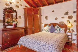 Posteľ alebo postele v izbe v ubytovaní Casita Roque Nublo