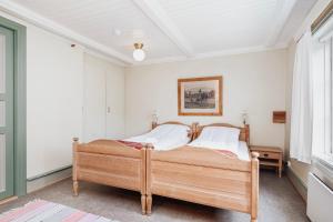 Postel nebo postele na pokoji v ubytování Kongsvold Fjeldstue by Frich`s