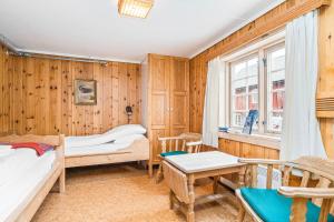 Postel nebo postele na pokoji v ubytování Kongsvold Fjeldstue by Frich`s
