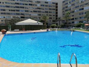 Bazén v ubytovaní Apartment Molinos Relax alebo v jeho blízkosti