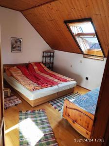 Кровать или кровати в номере Two-Bedroom Apartment in Balatonbereny II