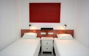 Postel nebo postele na pokoji v ubytování PALMENGARTEN APARTMENT Los Molinos + 28 fotografií